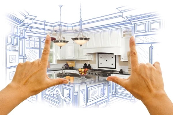 2 hands framing a kitchen photo with the rest of the image drawn