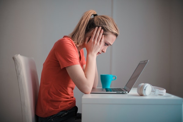 girl stressed at computer